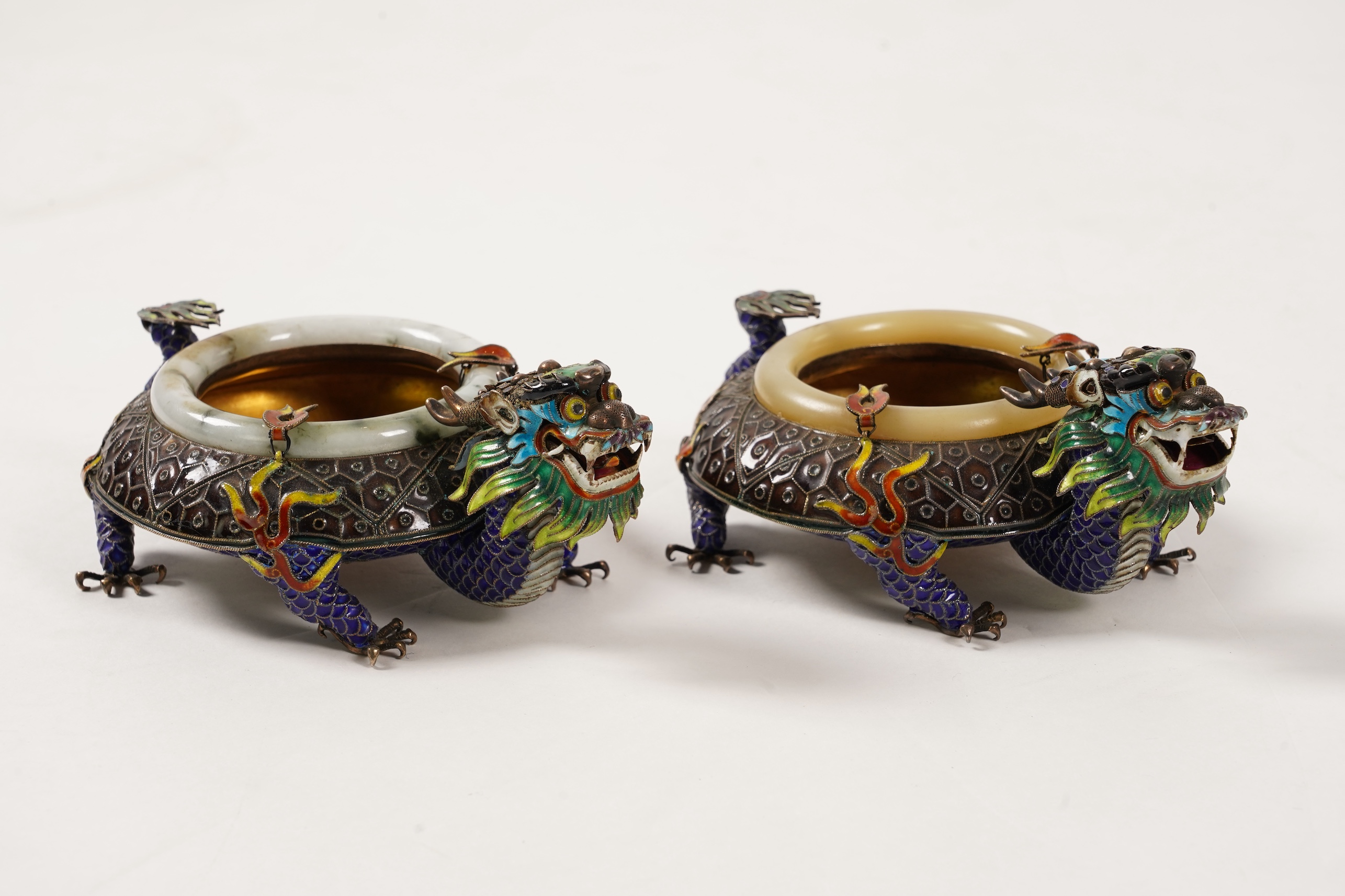 A pair of Chinese silver-gilt and enamel ’dragon’ bowls, 20th century